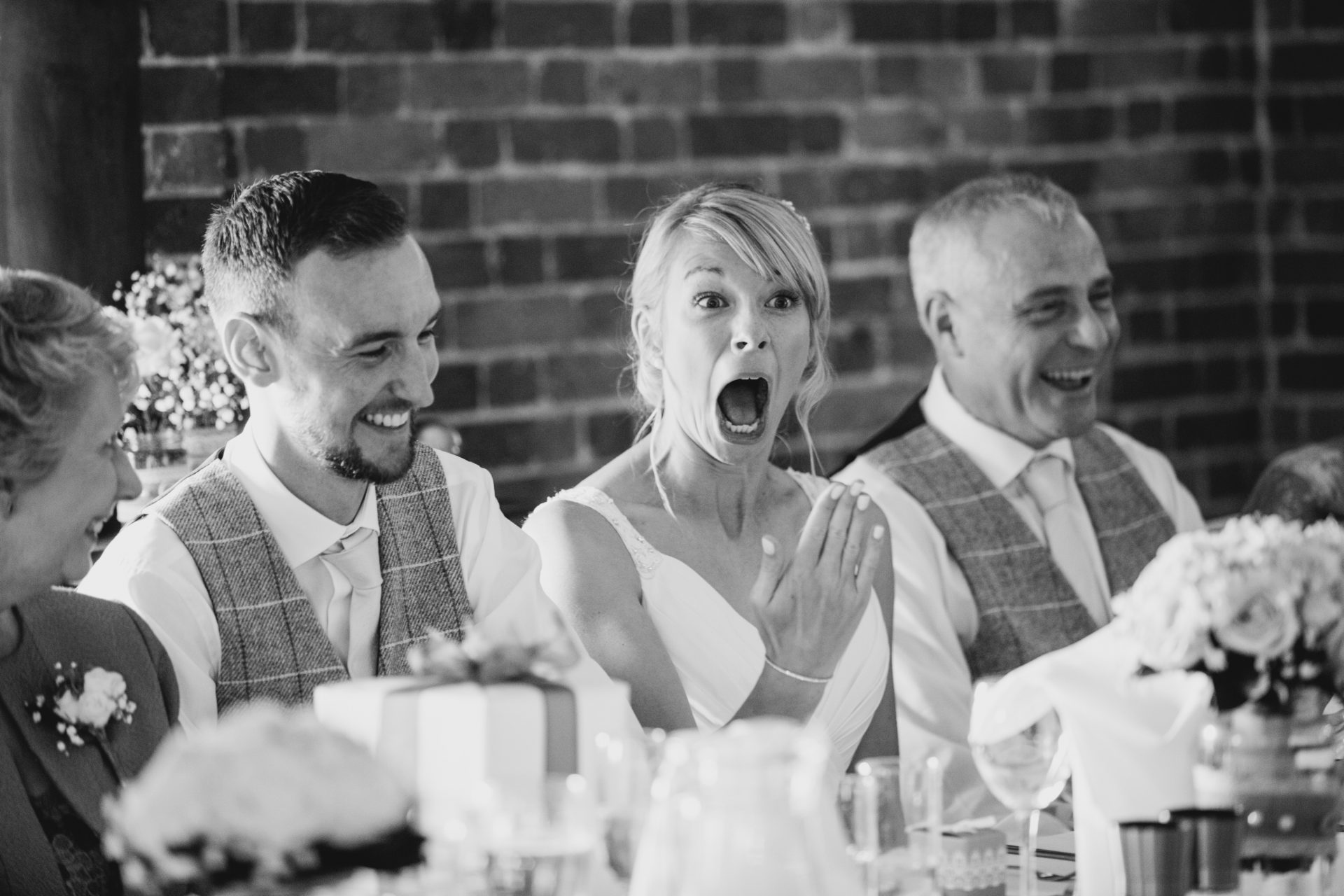 bride's reaction during wedding speeches