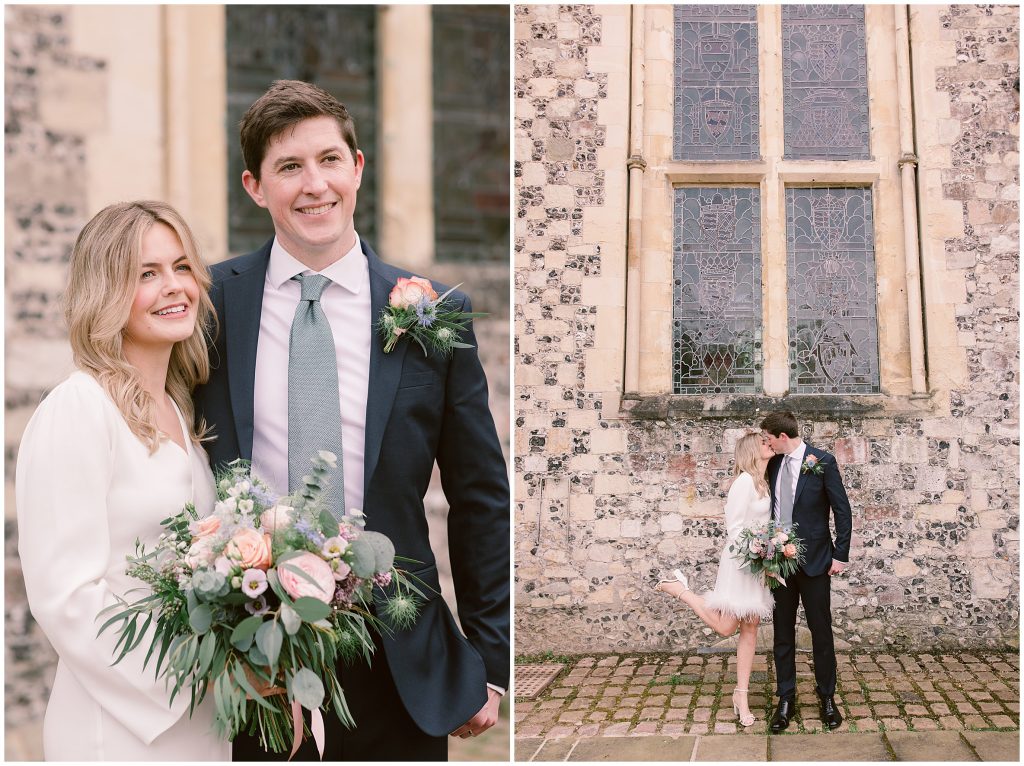 couple by cobble stone building outside their Wedding at Winchester Registry Office